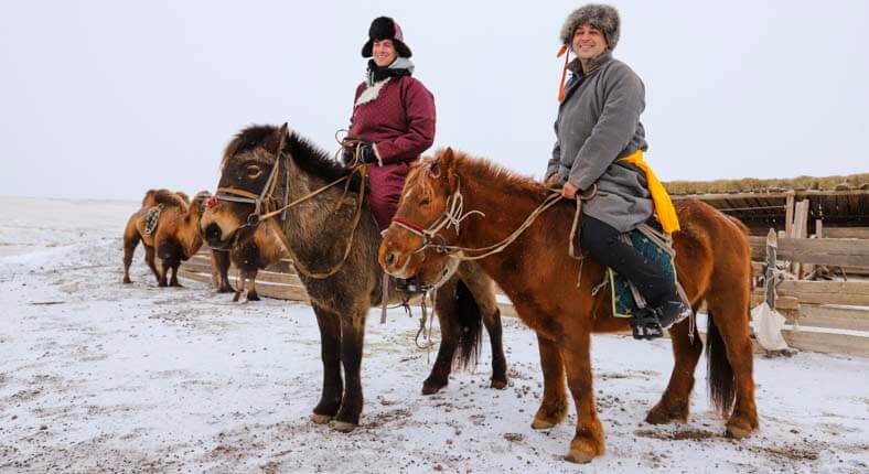 Mongolia winter horse riding